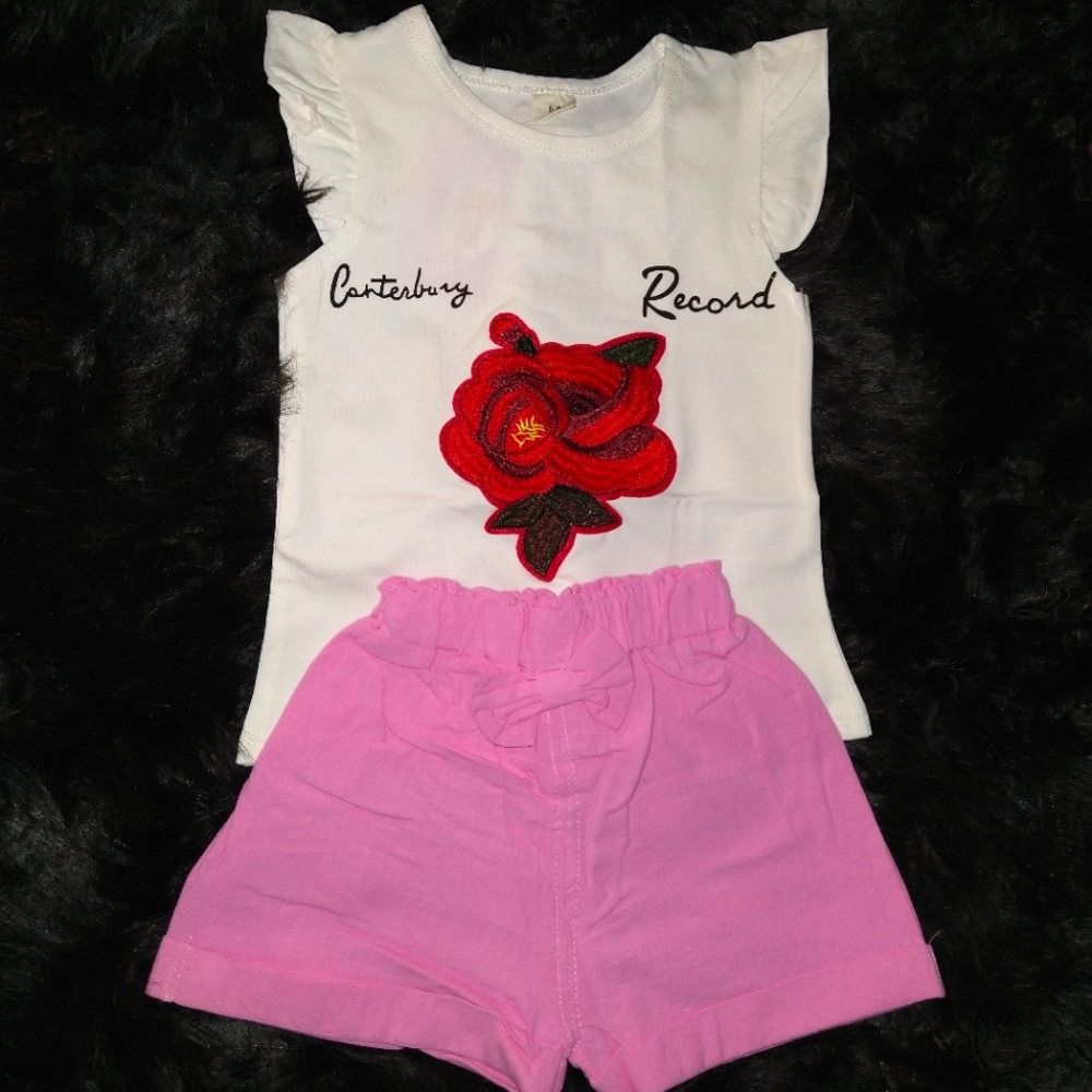 Pink lightweight two-piece outfit.
